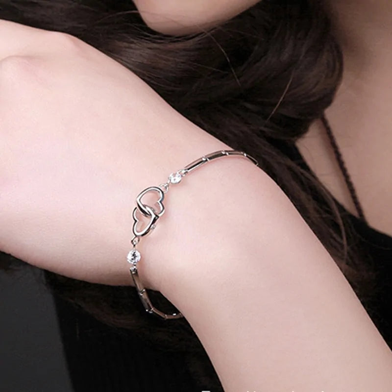 Pulsera de doble corazón en plata de ley 925