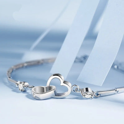 Pulsera de doble corazón en plata de ley 925